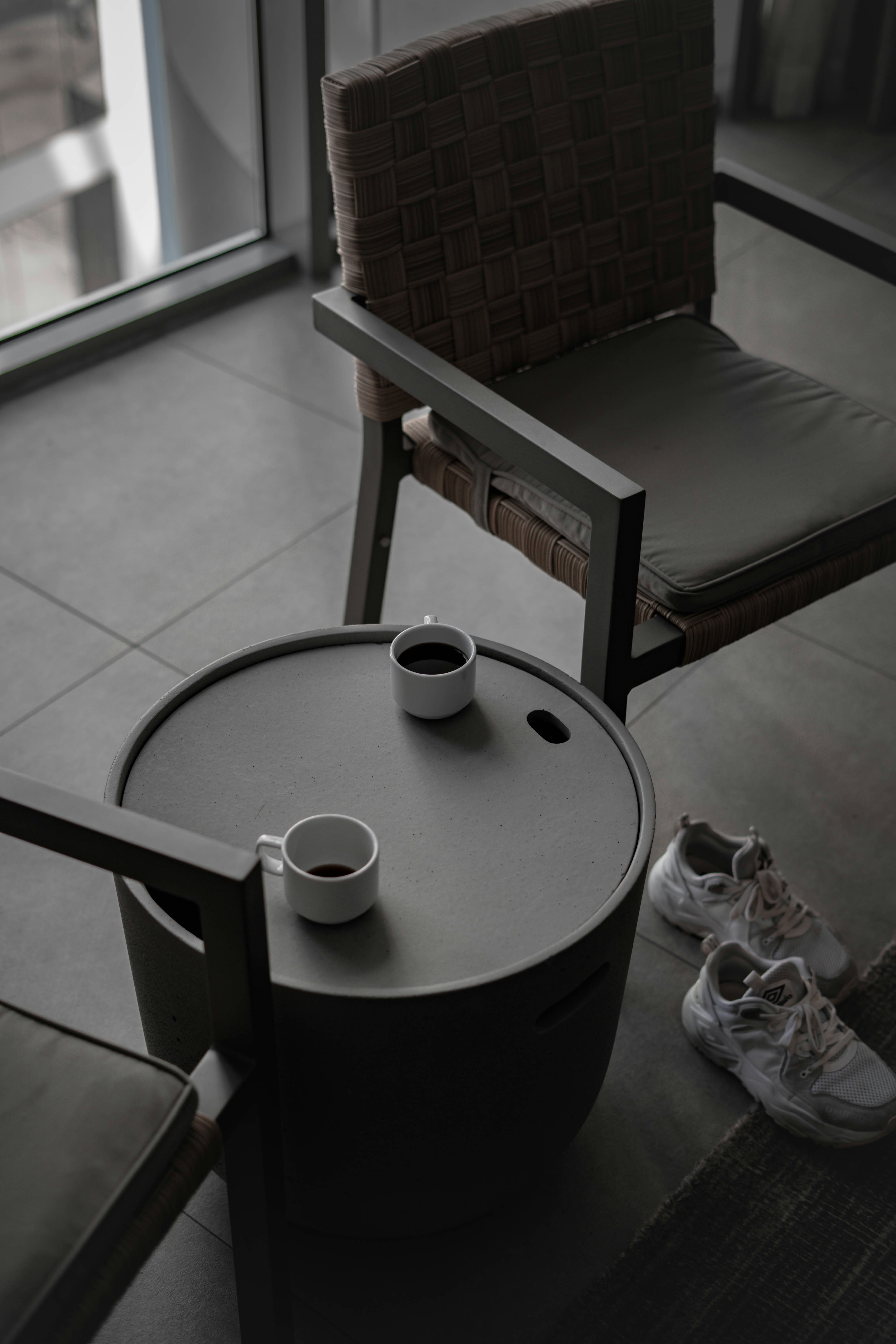 white ceramic mug on brown wooden table